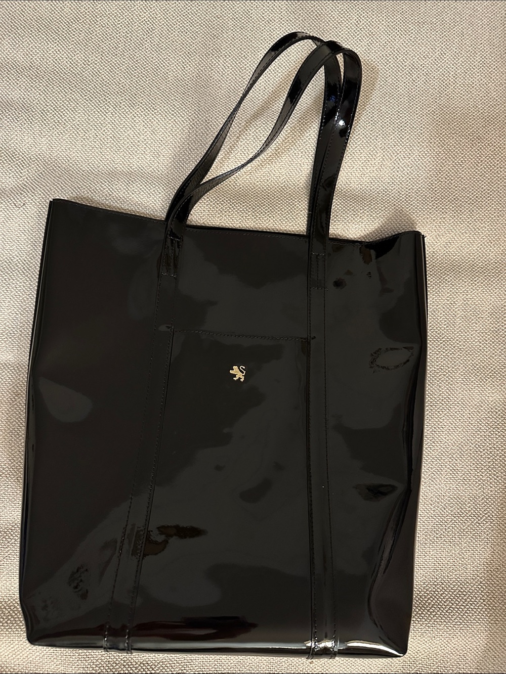 Black Patent Tote with Subtle Gold Emblem